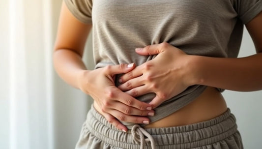 Woman Holding Stomach Showing Signs Of Bad Gut Health